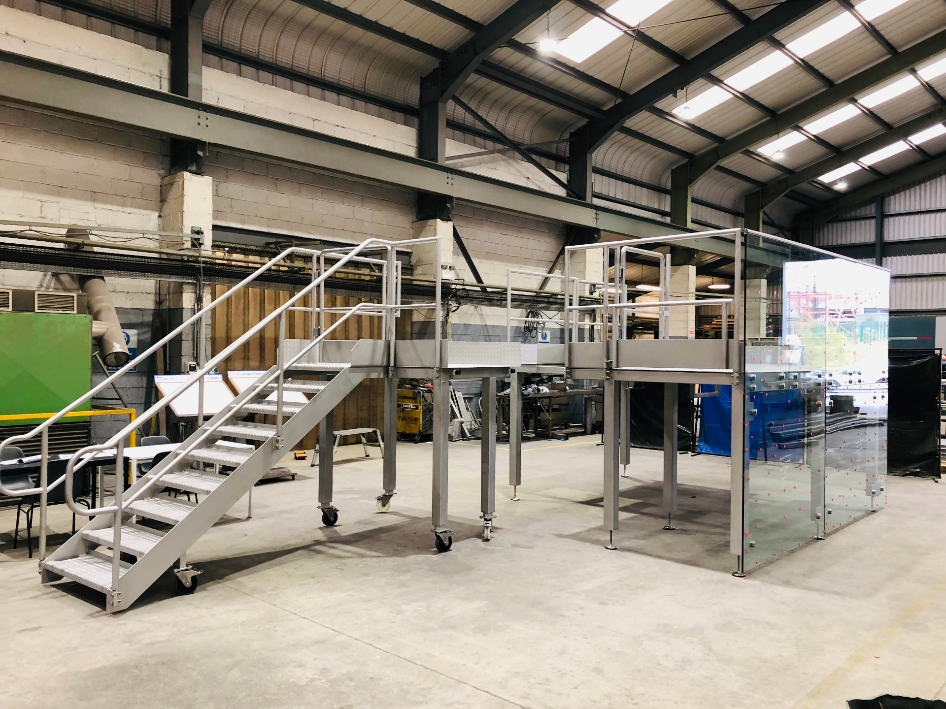 Stainless steel access platform with staircase and handrails fabricated in the workshop